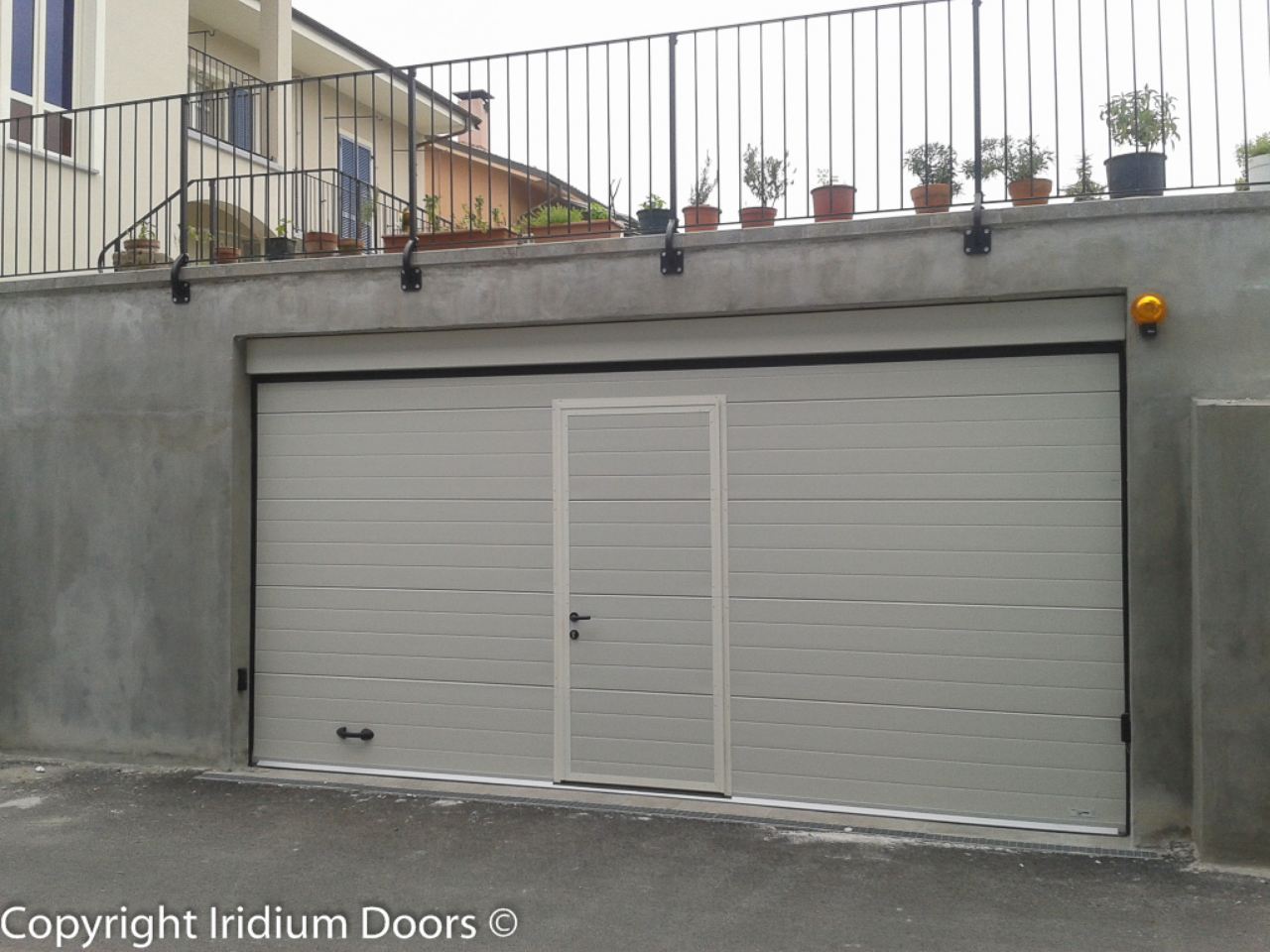 Iridium Doors Portone Sezionale con portina 217