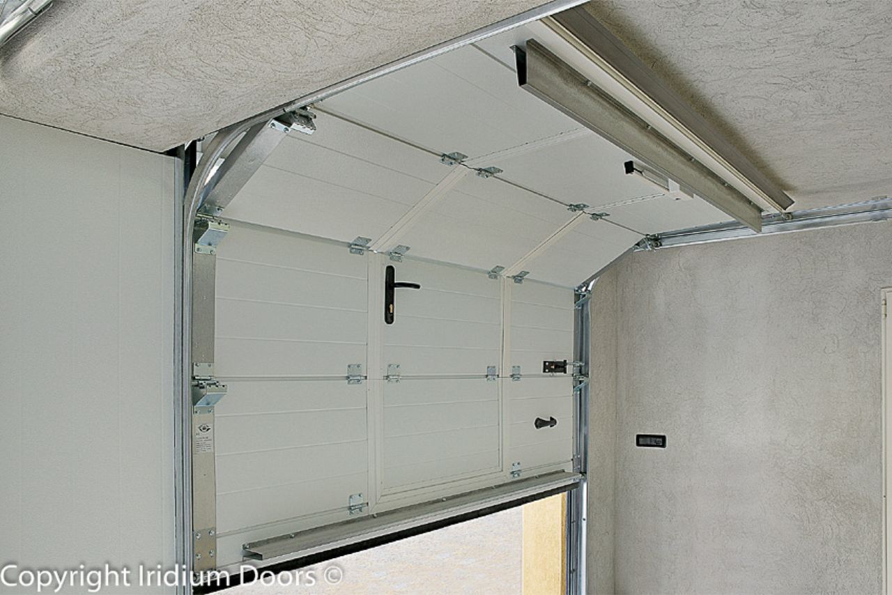 Iridium Doors Sezionale garage con portina apertura 185